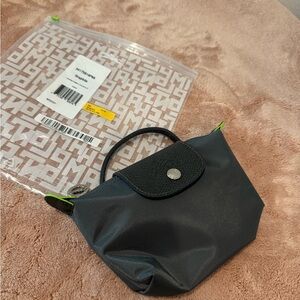 Longchamp Black Cosmetic Bag with Green Accents